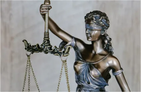 Statue of Lady Justice holding scales